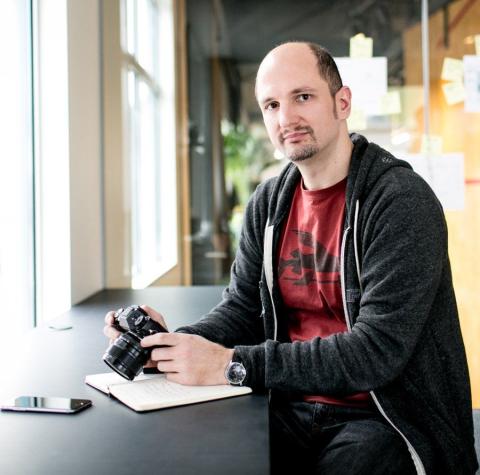 Robert holding a camera